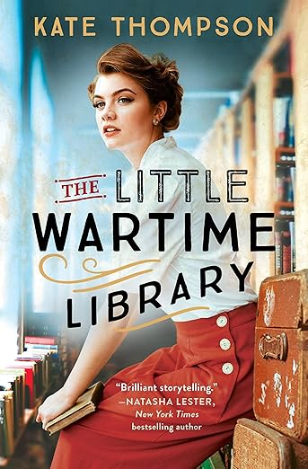 Book "The Little Wartime Library" buy Kate Thompson.  Cover picture of lady with red skirt and white blouse in a library.
